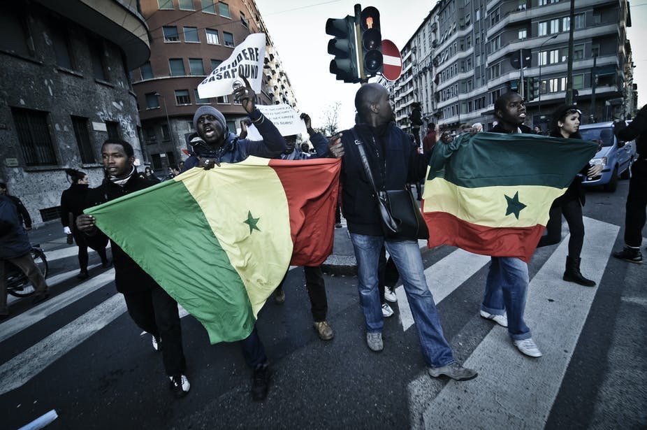 Des migrants sénégalais protestent contre le racisme et la violence à Milan. Eugenio Marongiu/Shutterstock Des migrants sénégalais protestent contre le racisme et la violence à Milan. Eugenio Marongiu/Shutterstock